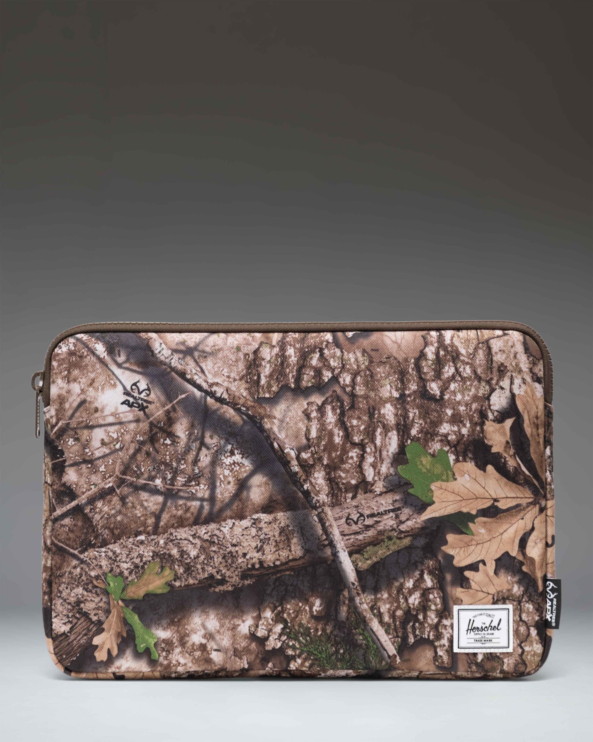 Herschel Supply Co. Realtree Anchor 14 Inch Sleeve